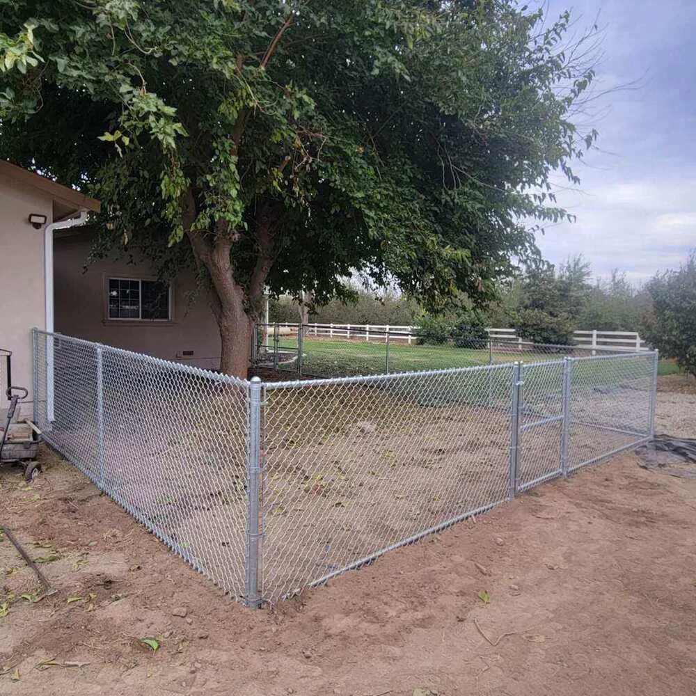 chain-link-fence-installation-with-big-tree-inside-in-manteca-ca